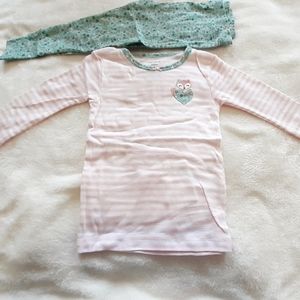 two  carter's  pajamas  in  size  24  months.
